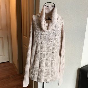 Tan sweater with slouchy turtle neck
